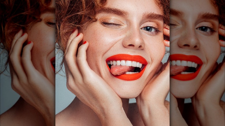 Redhead wearing red lipstick