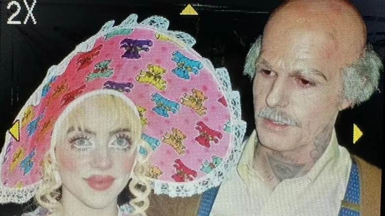 Billie Eilish and Jesse Rutherford dressed as a baby and an old man in a deeply inappropriate Halloween outfit