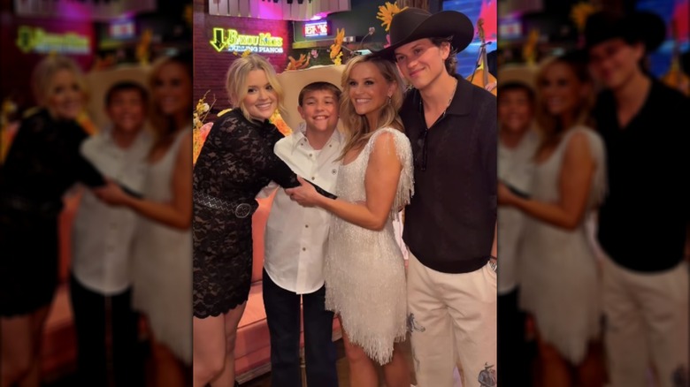 Reese Witherspoon poses for a birthday photo with her three children in an Instagram post.