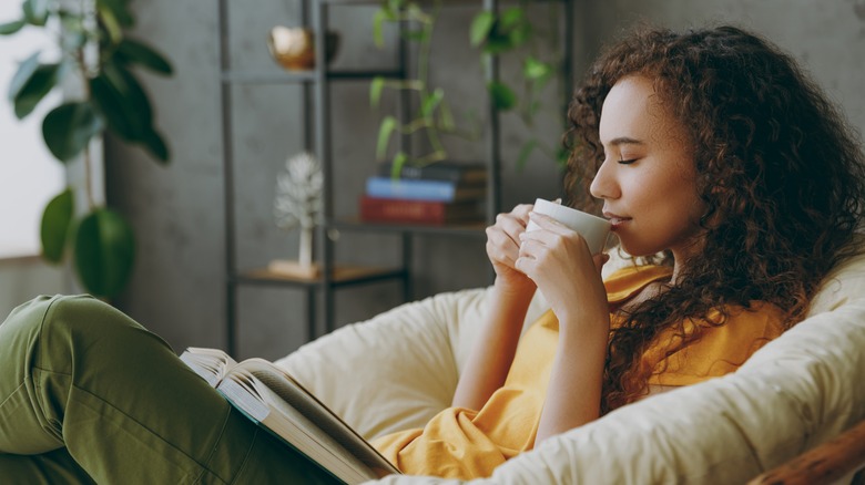Woman relaxing and reading