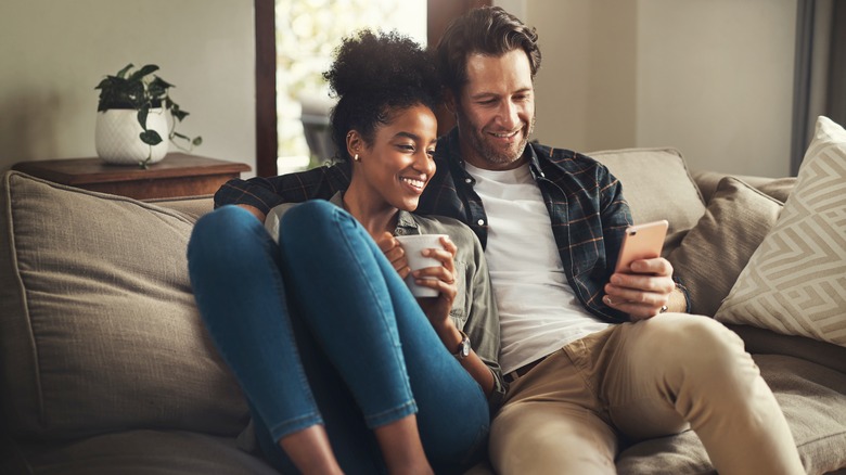 Couple sitting on couch