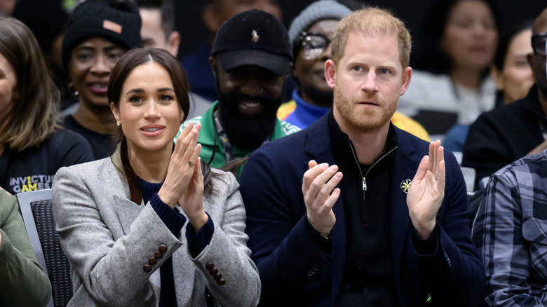 Meghan Markle and Prince Harry clapping