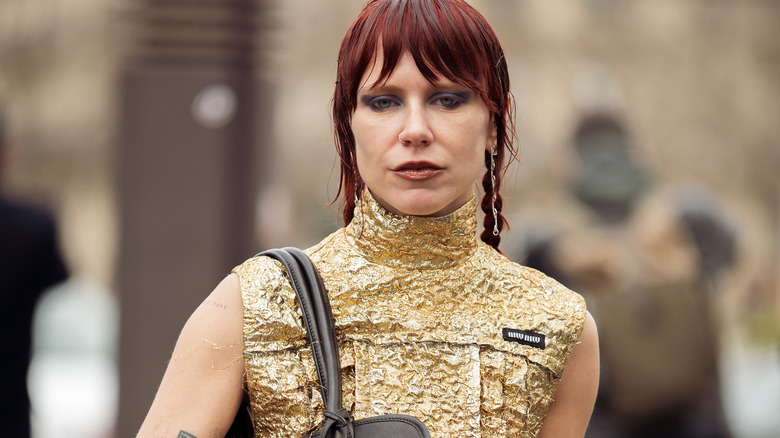 Courtney Trop with burgundy hair