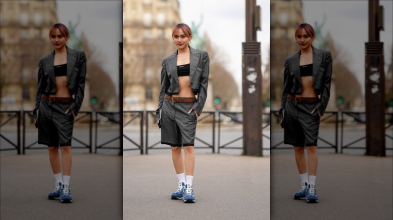 Woman wearing denim sneakers
