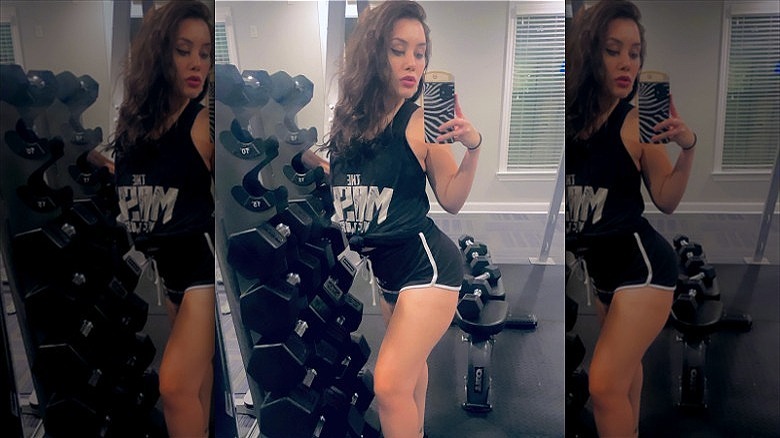 woman wearing black track shorts at gym