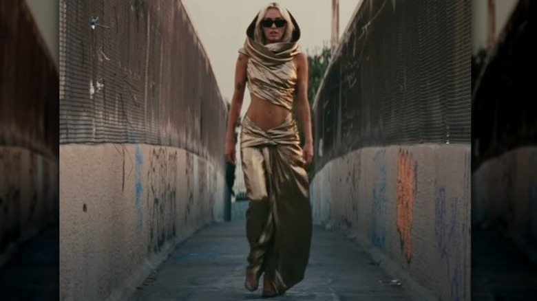 Miley Cyrus wearing gold