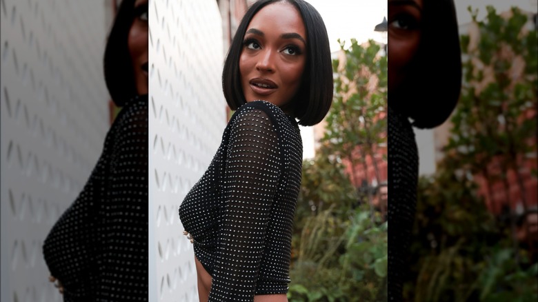 woman wearing rhinestone wrap top