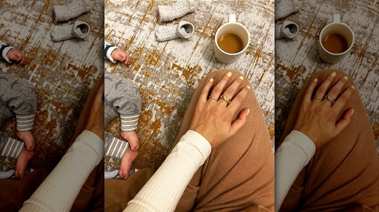woman wearing gold fashion rings