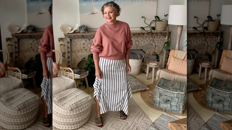 woman in striped skirt