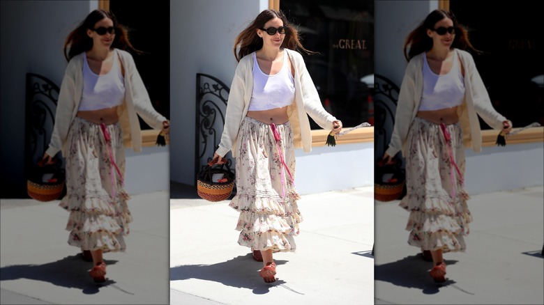 woman wearing floral ruffled skirt