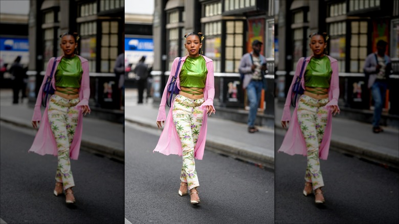 woman wearing pink and green y2k outfit