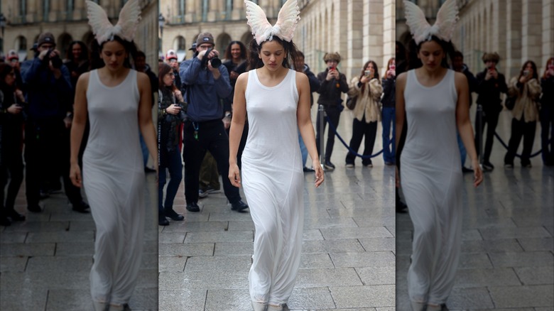 Rosalía in a white tank dress