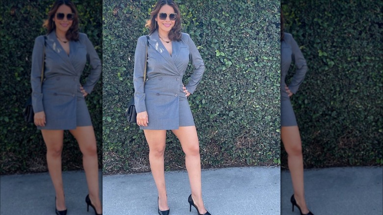 Woman wearing gray suit dress