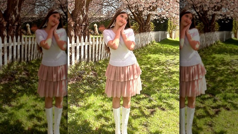 woman in ink ruffled skirt