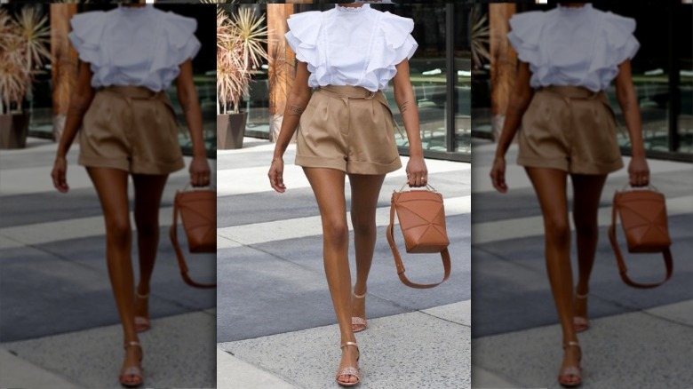 Woman in shorts with a neutral shoe