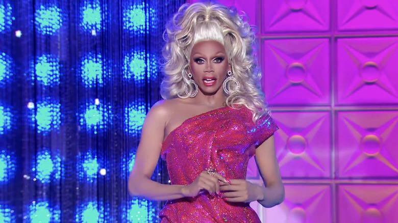 RuPaul in a hot pink dress