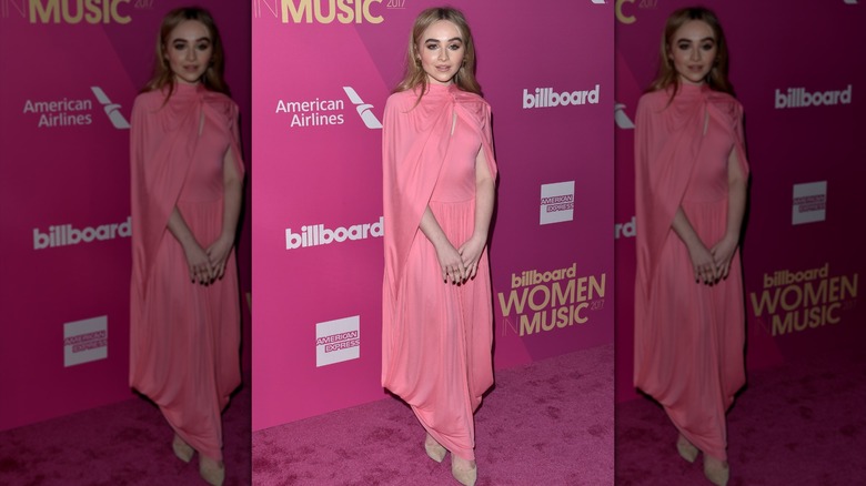 Sabrina Carpenter at the 2017 Billboard Women in Music event in a pink ensemble