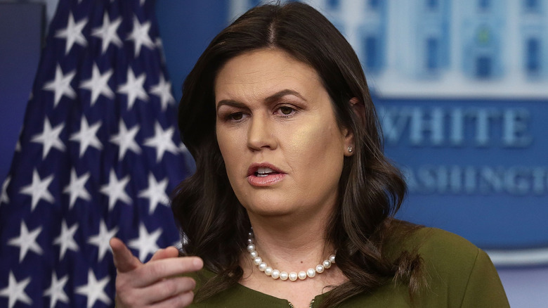 Sarah Huckabee Sanders with wavy hair