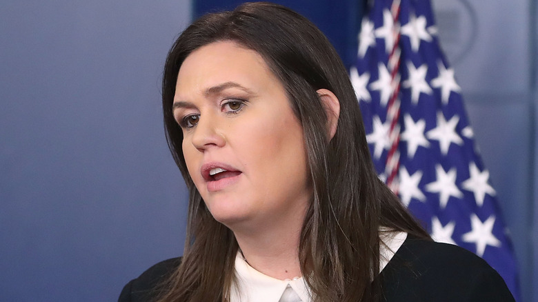 Sarah Huckabee Sanders giving a press briefing