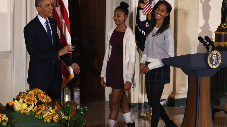 Barack, Sasha, and Malia Obama in November 2014 at the White House