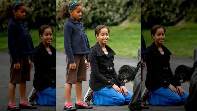 Sasha and Malia Obama meeting their dog, Bo