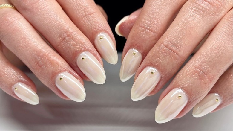 close up of cream satin nails