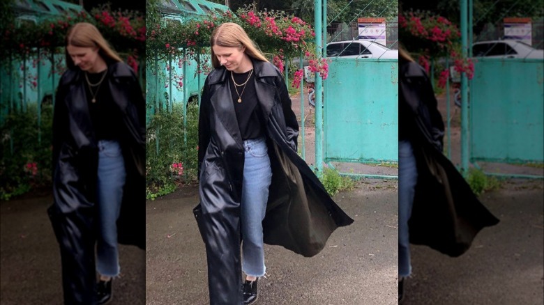 A woman wearing a satin coat