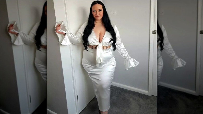 A woman wearing a satin set