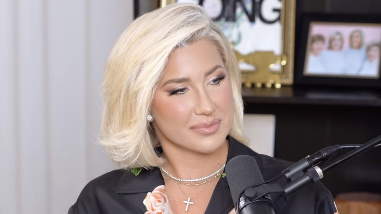 Savannah Chrisley interviews a guest on her podcast