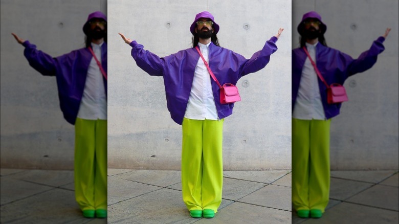 A man wearing a colorful outfit