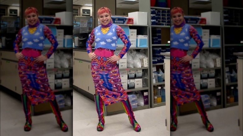 A woman wearing a colorful outfit