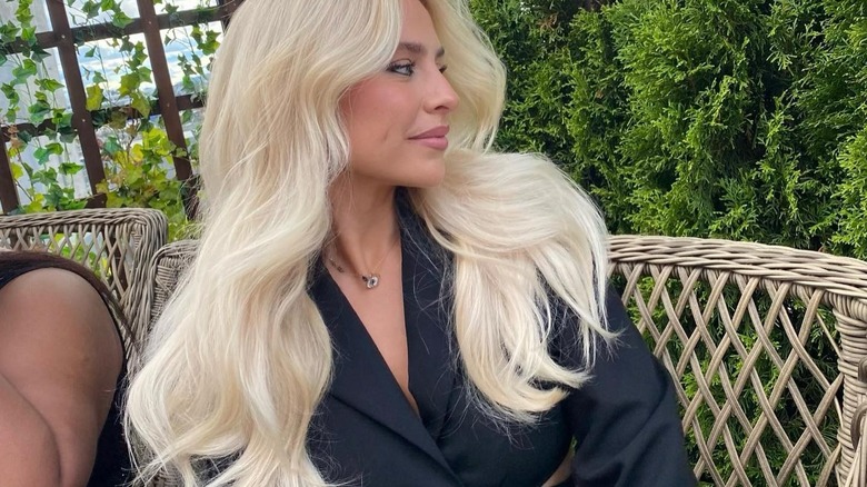 Blond hair with layers in the wind