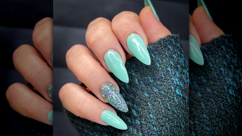 blue polish with sparkle statement nail