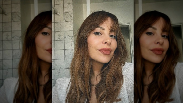 woman with DIY see-through bangs