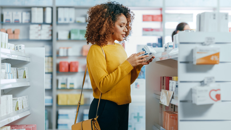 woman buying medicine