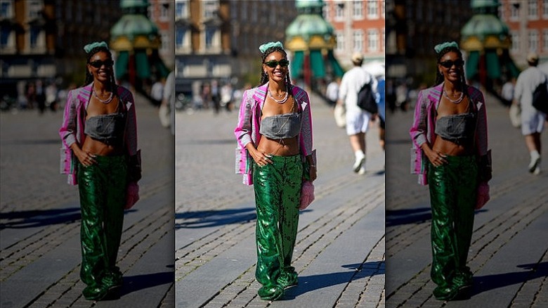 woman wearing blazer and sequined pants