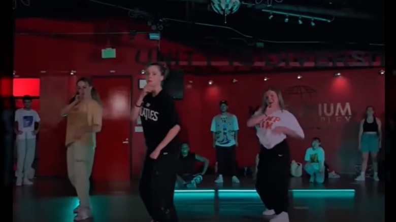 Shiloh Jolie-Pitt dancing with group