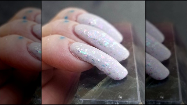 long nails with white shimmer nails