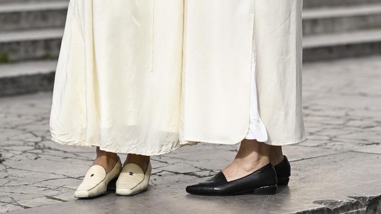 women wearing classy loafers at paris fashion week