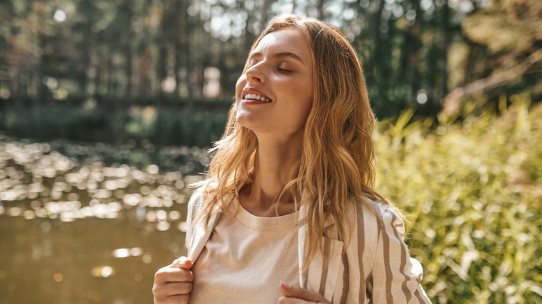 peaceful woman in forest