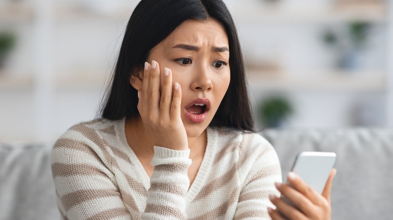 woman looking surprised