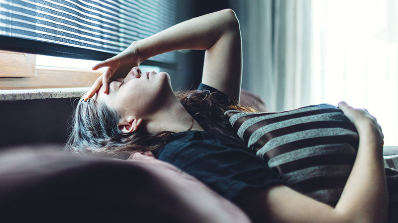 frustrated woman on sofa