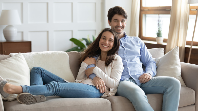 Happy couple cuddling