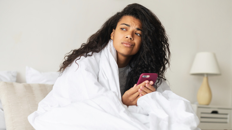 Woman looking suspicious