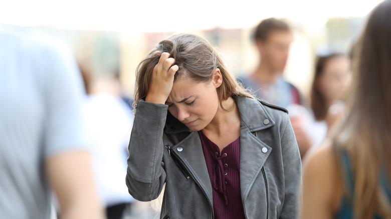 Woman feeling overwhelmed