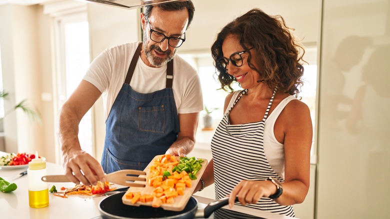 Couple cooking together