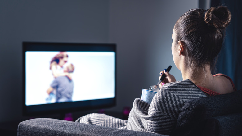 Woman eating ice cream alone 