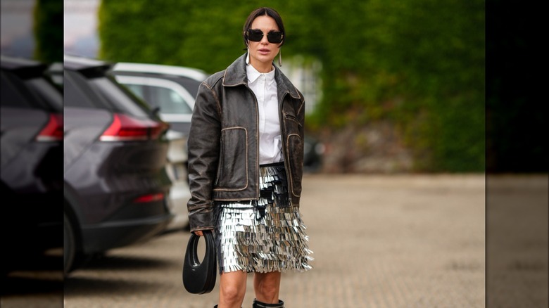 woman wearing silver skirt