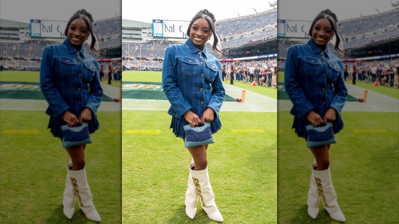 Simone Biles wearing an all-denim outfit at a Chicago Bears game