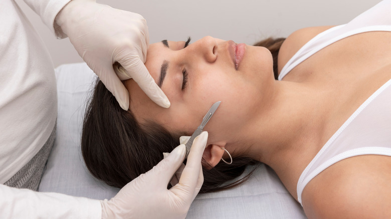 A woman getting dermaplaning.